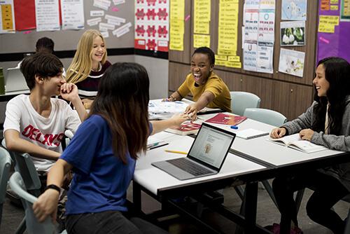 middle school students engaged in group work