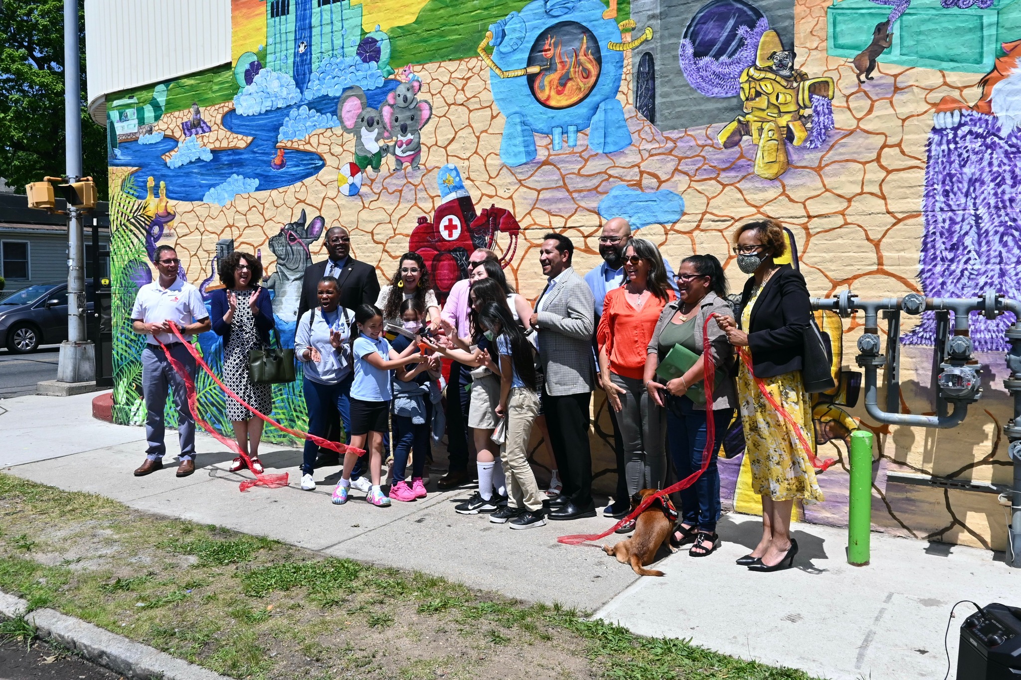 William N. DeBerry Elementary School teachers in front of mural